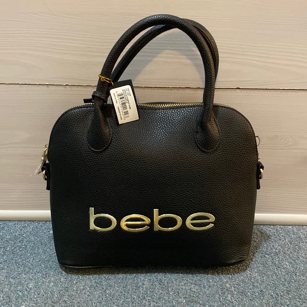 Black and gold bebe purse